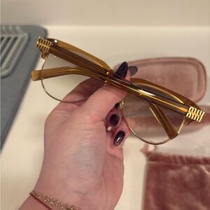 Miu miu Gold sunglasses